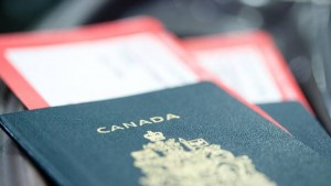 The European Union executive is considering whether to make U.S. and Canadian citizens apply for visas before travelling to the bloc. (www.jupiterimages.com)